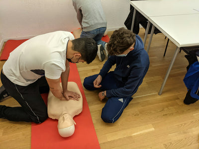 Creating a Heart-safe Workspace with AED Programs: Essential Steps, Training, and Maintenance